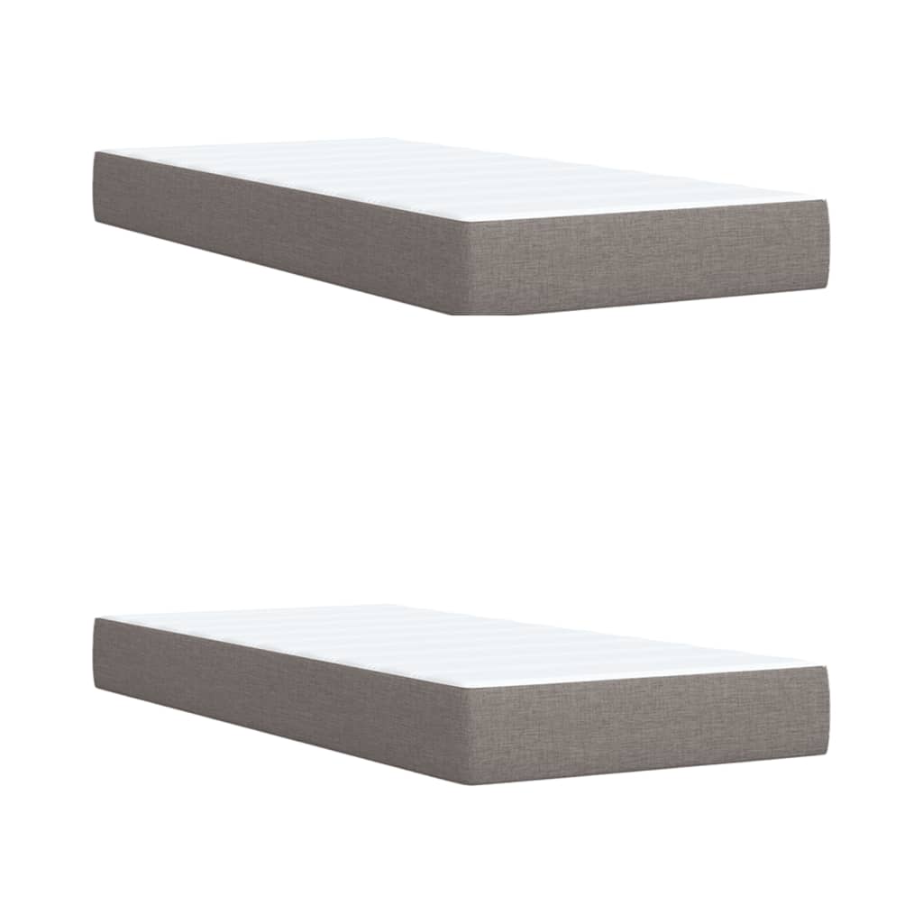 Taupekleurige boxspring van 200x200 cm met pocketveringmatrassen, topmatras en gestoffeerd hoofdbord