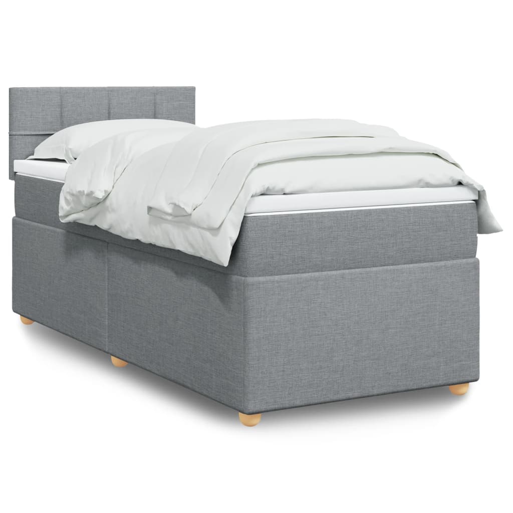 Taupekleurige boxspring van 200x200 cm met pocketveringmatrassen, topmatras en gestoffeerd hoofdbord
