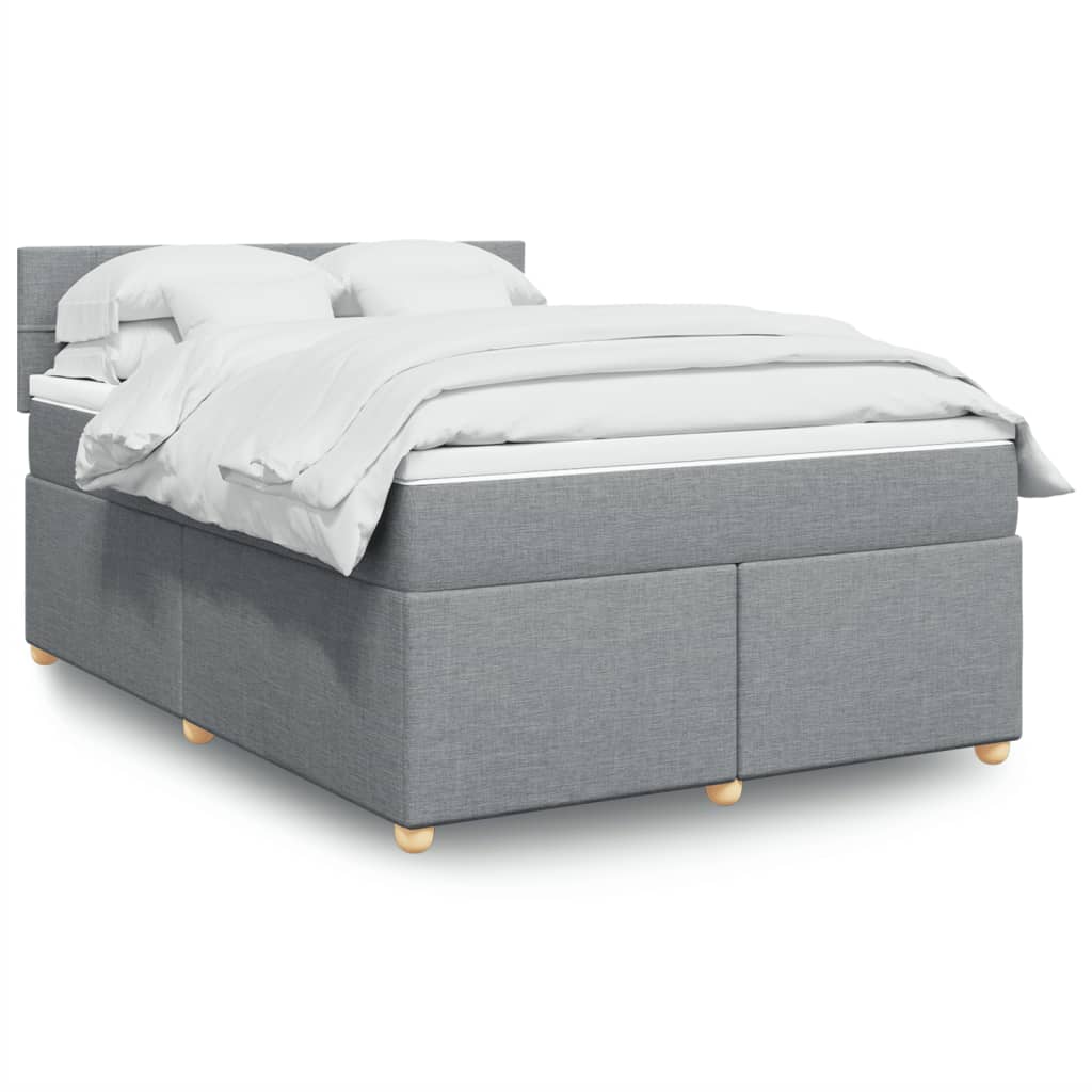 Taupekleurige boxspring van 200x200 cm met pocketveringmatrassen, topmatras en gestoffeerd hoofdbord