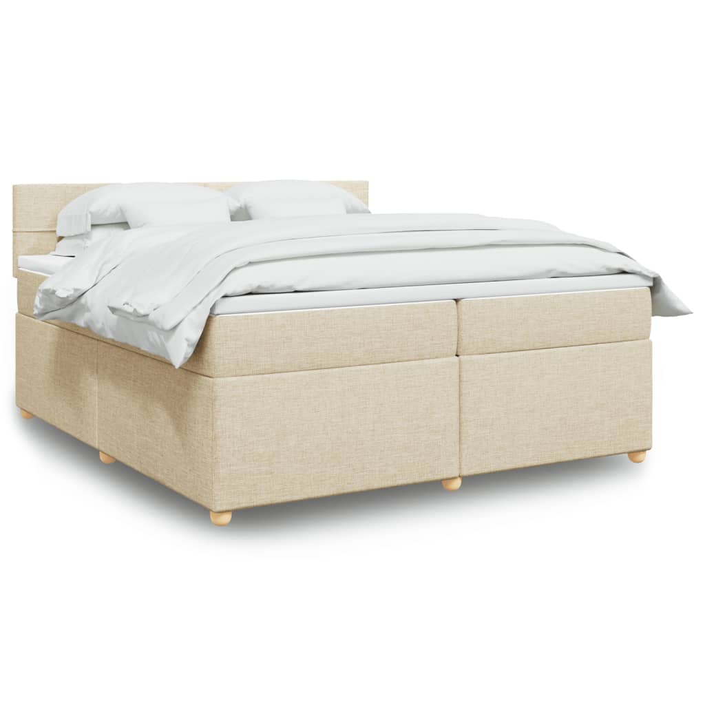 Taupekleurige boxspring van 200x200 cm met pocketveringmatrassen, topmatras en gestoffeerd hoofdbord