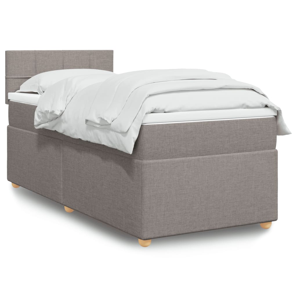 Taupekleurige boxspring van 200x200 cm met pocketveringmatrassen, topmatras en gestoffeerd hoofdbord
