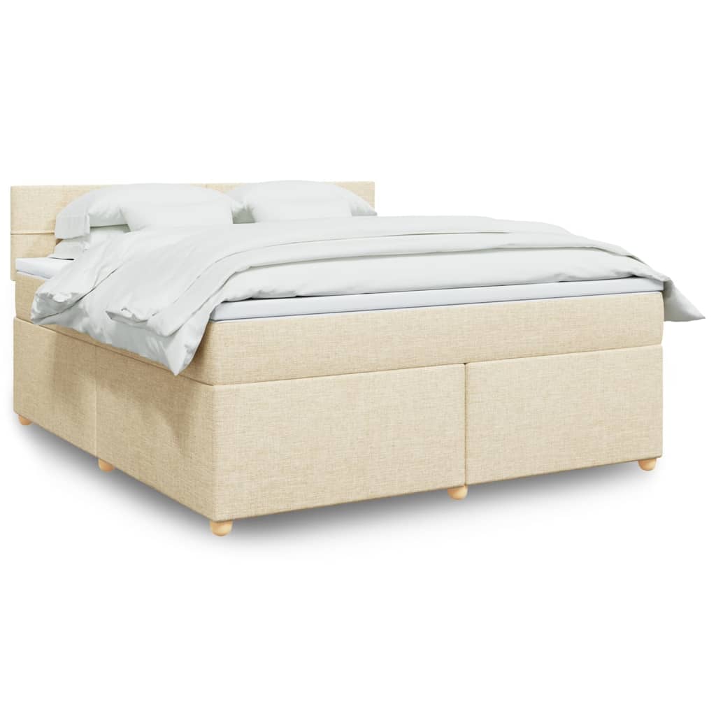 Taupekleurige boxspring van 200x200 cm met pocketveringmatrassen, topmatras en gestoffeerd hoofdbord