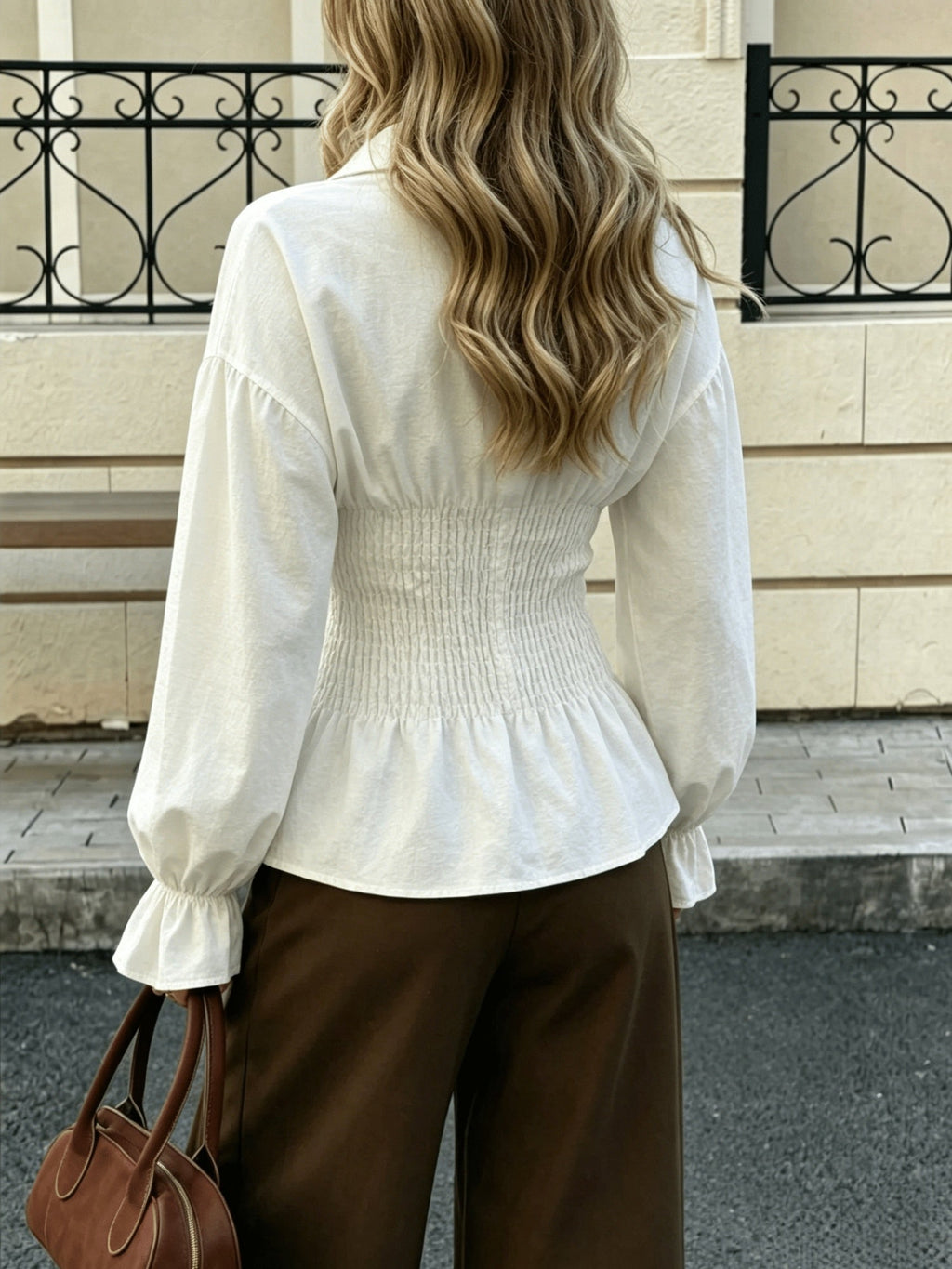 Elegante damesblouse met pofmouwen en getailleerde pasvorm