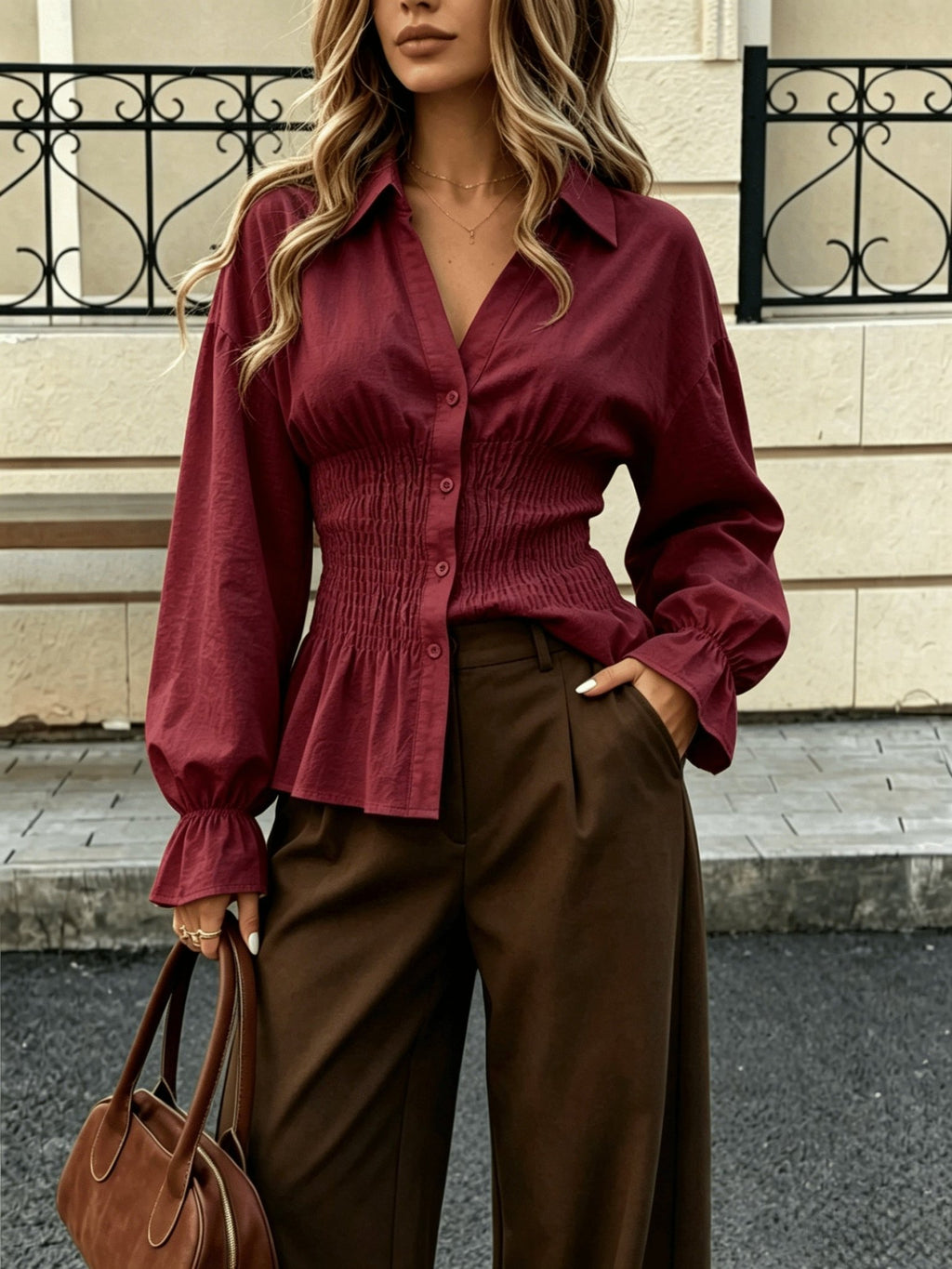Elegante damesblouse met pofmouwen en getailleerde pasvorm