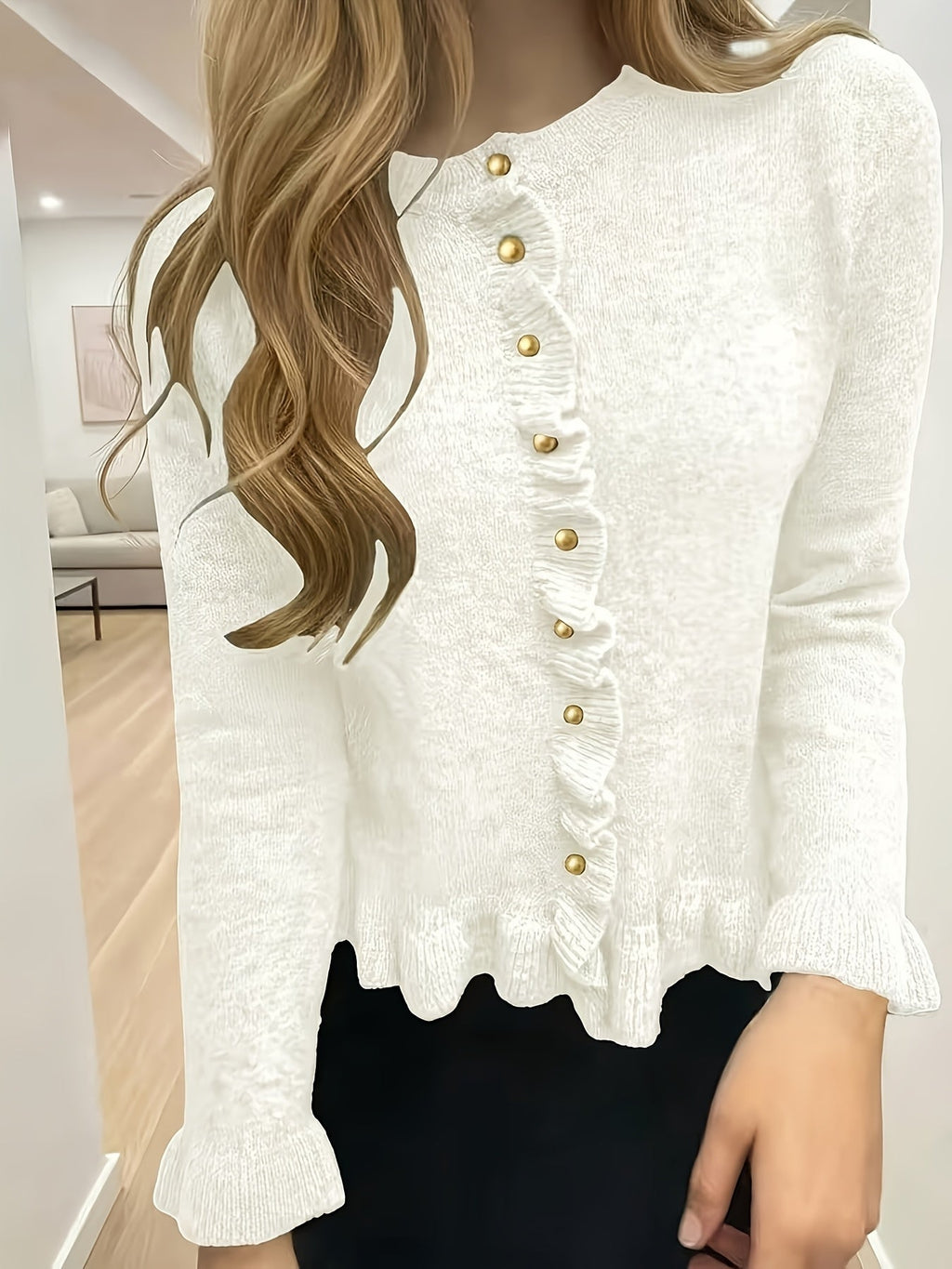 Damesvest met elegante parelknopen