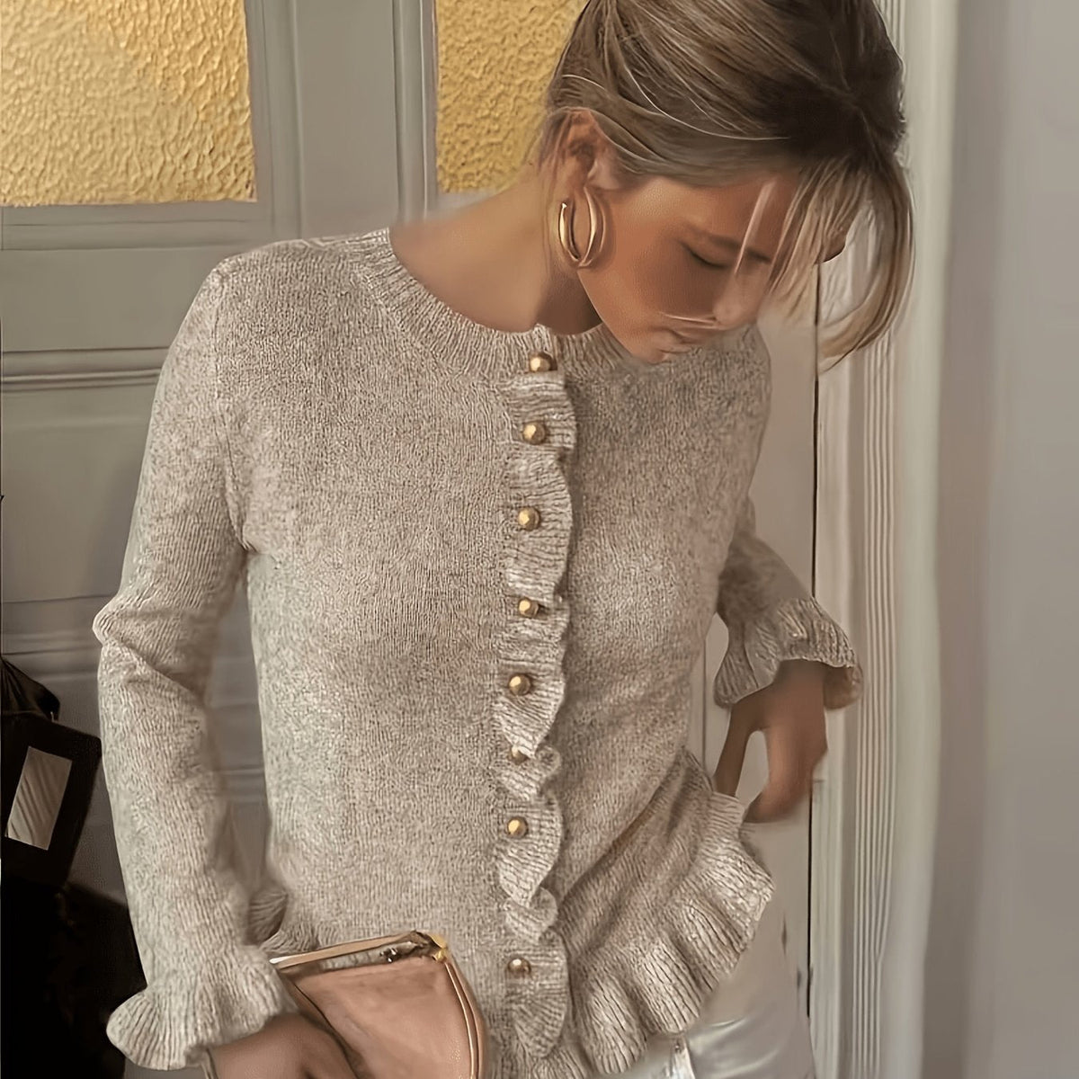 Damesvest met elegante parelknopen