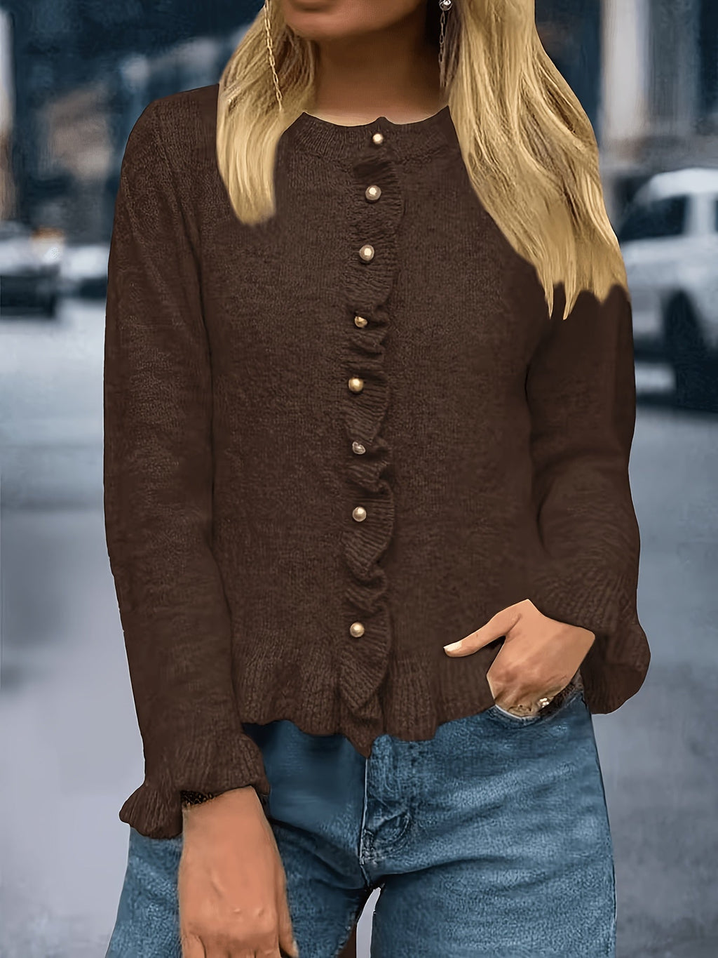 Damesvest met elegante parelknopen