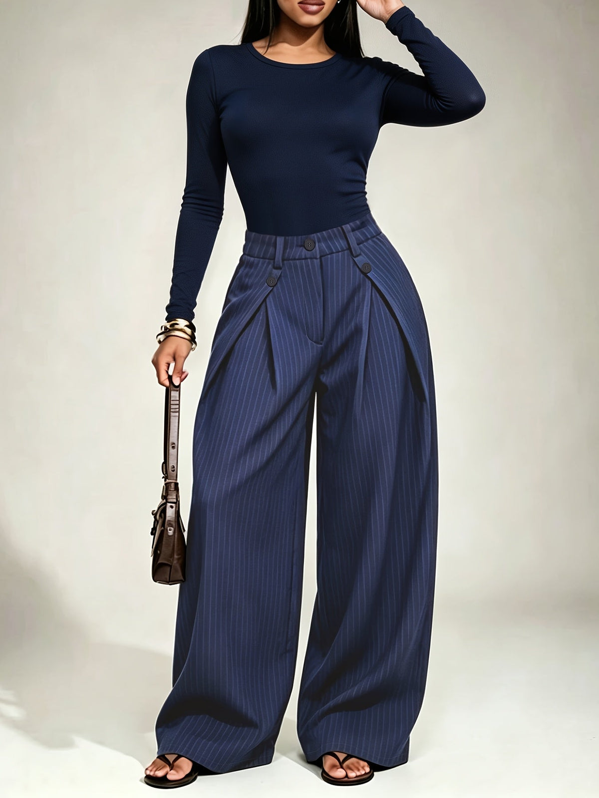 Gestreepte damesbroek met high-waist taille en wijde pijpen