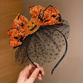Halloween haarband voor dames met pompoen en strik