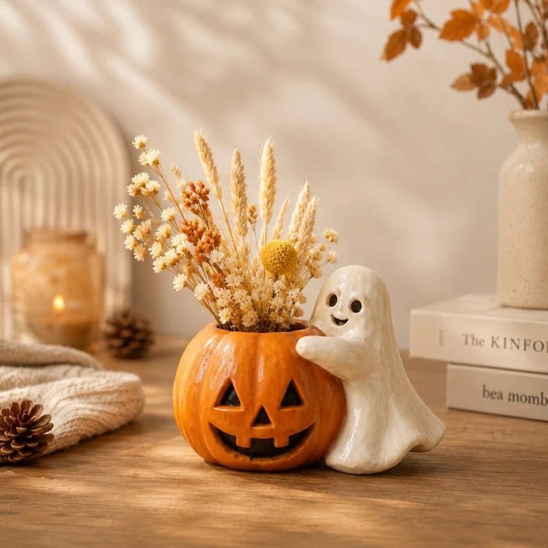 Halloween pompoen bloempot met spookdecoratie
