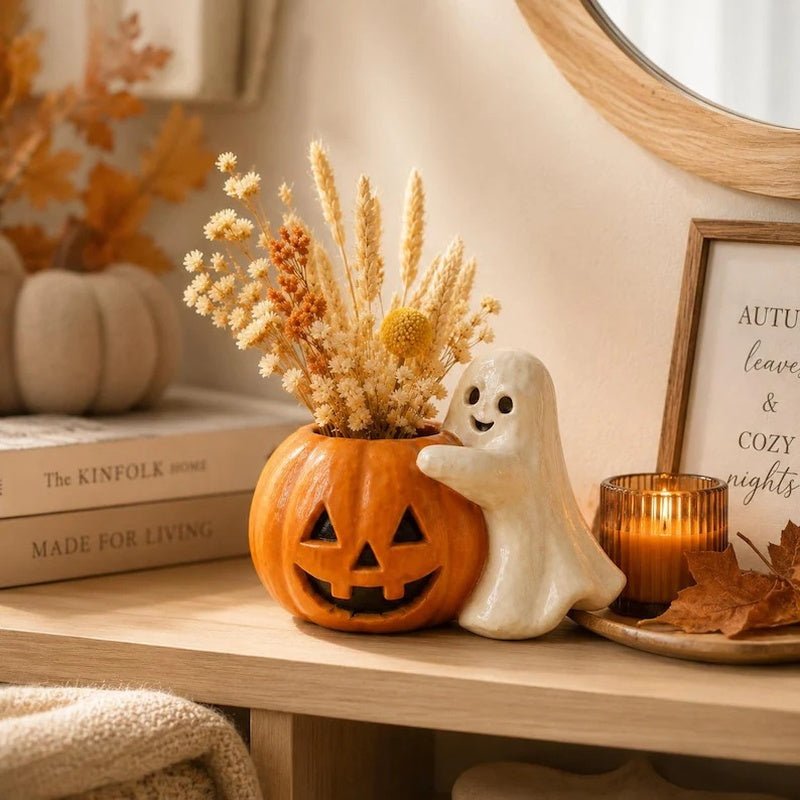 Halloween pompoen bloempot met spookdecoratie