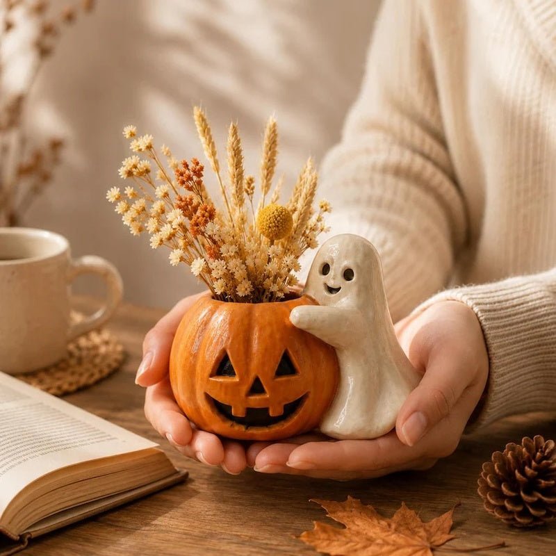 Halloween pompoen bloempot met spookdecoratie