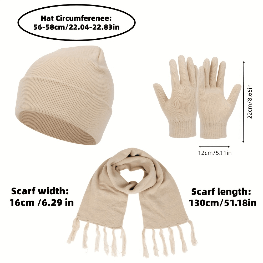 Gebreide wintermuts met kwastje uit een complete winterset